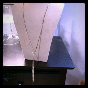 Long gold necklace